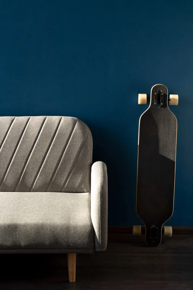 Choosing Throw Blankets Cushions and Ottomans That Complement a Grey Sofa